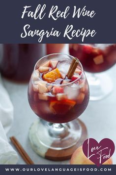 fall red sangria is made with apple cider and served in a goblet