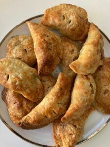 several pastries are arranged on a plate