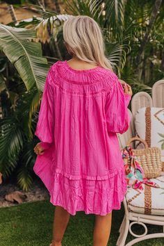 - Live your best beach life with this flowy dress! - Lightweight material with a built-in partial lining - A ruffled v-cut neckline with a tie detail - Gathered ruffles at the yoke - Long, loose sleeves with smocked cuffs - A relaxed silhouette that ends in a mini dress length hemline Loose Sleeves, V Cut, Flowy Dress, V Cuts, The Coast, In Hot, Beach Life, Live For Yourself, Shift Dress