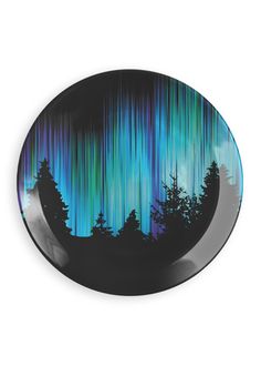 a plate with an image of the aurora bore in blue and green lights on it