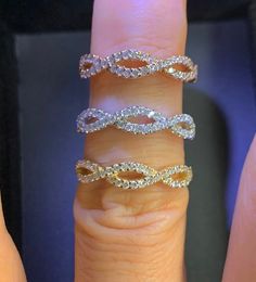 Infinity Diamond Band in white yellow or rose gold. Perfect to wear on its own or stack with another ring. Show her you love her for infinity with this ring. Measures 4.25mm width in center and tapers down smaller. Rose gold & white gold sold out, can be special order takes 2-3 weeks. Natural round brilliant cut diamonds total weight: 0.40 Carats Clarity: SI Color: G/H White and sparkling diamonds 14K Solid Gold your choice in Rose, Yellow, or White Gold ) (white Sold out) Stock Ring Size 6 Infinity Stackable Rings For Wedding, Infinity Stackable Wedding Rings, White Gold Infinity Eternity Band For Anniversary, Infinity Diamond Eternity Band For Wedding, Diamond Eternity Band With Infinity Design For Wedding, Rose Gold Infinity Stackable Wedding Rings, Modern Twist Infinity Diamond Wedding Ring, Stackable Infinity Wedding Rings, Stackable Infinity Rings For Weddings