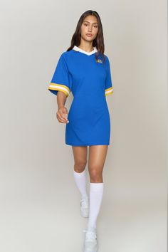 Guizio x Champion Waisted Jersey Dress Sporty Short Sleeve Stretch Dress, Sporty Stretch Short Sleeve Dresses, Sporty Stretch Dress With Short Sleeves, Blue Fitted Sporty Tennis Dress, Sporty Fitted Blue Tennis Dress, Sporty V-neck Sports Dress, Casual Short Sleeve Stretch Tennis Dress, Casual Tennis Dress With Short Sleeves And Stretch, Fitted Blue Tennis Dress Athleisure Style