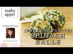 two spinach balls sitting on top of a wooden cutting board next to a woman