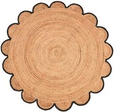 a wooden placemat with a circular design on it's center piece, made out of wood