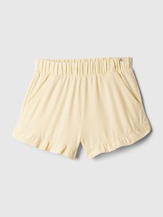 Soft knit pull-on shorts with light stretch.  Elasticized waist.  Front slant pockets.  Ruffle hem.  Certain styles have an allover print.  Easy pull-on waist.  Easy through the hip and thigh.  Sizes range from baby to toddler.