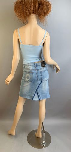 Vintage up-cycled light blue denim jeans skirt made from Cheap Monday Jeans in excellent condition size 26. Low waist 30 Hip 31 Waist to hem 19 inches Fitted Cotton Cutoff Skirt, Fitted Distressed Medium Wash Mini Skirt, Ripped Fitted Denim Mini Skirt, Distressed Fitted Mini Skirt, Y2k Style Fitted Cutoff Denim Skirt, Fitted Cutoff Denim Skirt In Denim Blue, Fitted Cutoff Denim Skirt, Fitted Cutoff Medium Wash Skirt, Fitted Cutoff Skirt In Medium Wash