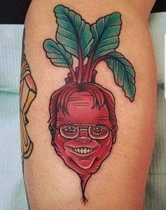 a person with a red radish tattoo on their leg, and wearing glasses