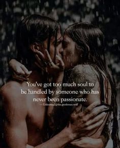 two people kissing in the rain with one holding his face to another's chest