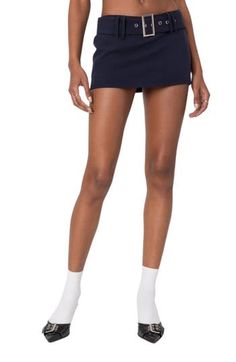 Show off your stems in this day-to-night skort topped with a wide belt. Attached belt 100% polyester Machine wash, dry flat Imported Fitted Skort With Belt Loops, Casual Fitted Belted Skort, Fitted Workwear Skort With Short Leg, Casual Mini Skirt With Belt Loops For Night Out, Casual Belted Mini Skort, Casual Above Knee Skort, Workwear Mini Skirt With Elastic Waistband, Elastic Waistband Mini Skirt For Work, Casual Belted Skort For Work