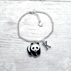 Super cute enamel panda charm bracelet perfect for any panda lover. Great little gift for kids or a present for mothers day. Perfect when ordered with my matching items that are available in my shop. *You can select the size from the drop down menu, available for children and adults. *The black and white enamel charm measures approximately 2cms long. *The charm, chain and other findings are silver plated. *These can also be personalised with initial charms which can be picked from the menu. ☆☆The bracelet comes presented in a gift bag but gift messages and  wrapping can also be purchased from my store.☆☆ If you have any questions or custom orders please feel free to message me. Panda Bracelet, Panda Charm, Bff Bracelets, Panda Gifts, Bracelet Cute, Animal Bracelet, Personalised Jewellery, Charm Chain, Mothers Day Presents