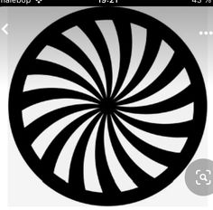 a black and white photo of a circular object in the shape of a spiral on a white background