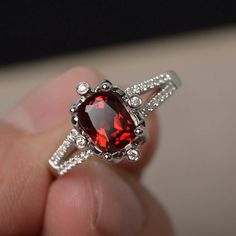 This is a gorgeous handmade creation. Its beauty is its simplicity & Elegance. The 6*8 mm cushion cut faceted natural Garnet is crafted in solid sterling silver and with rhodium plated. All item is sent in a beautiful gift box If you have any idea of design your ring,pls contact me directly. You can realize more lovely stuff clicking the link https://www.etsy.com/shop/knightjewelry?refshopsection_shophome_leftnav Please leave the correct address and you phone number for delivering successful Garnet Engagement Rings, Cushion Cut Rings, Garnet Wedding Rings, Citrine Ring Engagement, Garnet Wedding, Cut Rings, Marquise Cut Rings, Wedding Rings Art, Red Gemstone Ring