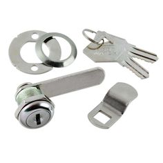 an assortment of keys and locks on a white background