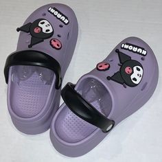 Kuromi Clogs Cute Purple Sanrio Clogs. New In Bag Trendy Non-slip Clogs With Round Toe, Trendy Non-slip Round Toe Clogs, Trendy Synthetic Slide Clogs, Trendy Flat Synthetic Clogs, Cute Synthetic Flat Slides, Casual Eva Clogs With Closed Toe, Trendy Non-slip Closed Toe Clogs, Purple Beach Clogs For Summer, Summer Closed Toe Plastic Clogs