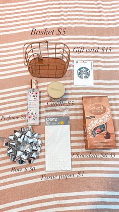 the contents of a basket sitting on top of a bed next to some paper and other items