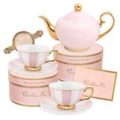 pink tea set with gold trimmings and matching cups