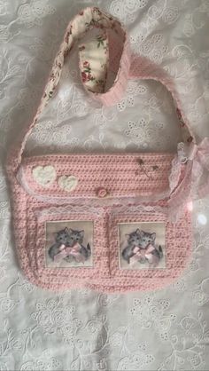 a crocheted purse with two pictures on it