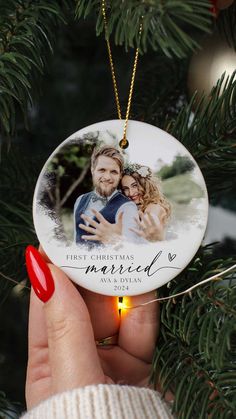 Celebrate your love with a beautiful watercolor photo ornament for your first Christmas together. Perfect for newlyweds looking to add a touch of romance to their holiday decor.