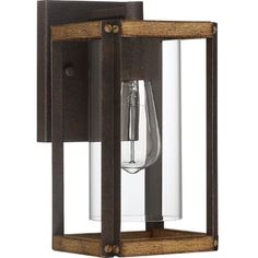 an outdoor wall light with a clear glass shade