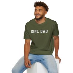 Celebrate Your Father-Daughter Bond with Our 'Girl Dad' T-Shirt – Comfort and Style in One! Show off your pride as a dedicated dad with our 'Girl Dad' unisex soft-style t-shirt. Made from incredibly soft materials, this tee offers a new level of casual comfort, perfect for any occasion. Whether you're attending a family outing, a casual event, or simply enjoying quality time with your daughter, this t-shirt is your go-to choice for both style and comfort. Crafted from 100% ring-spun cotton for solid colors, this lightweight fabric (4.5 oz/yd² or 153 g/m²) ensures a blissfully soft feel all year round. Heather colors and sports grey variants include polyester for added durability. The classic fit, combined with a crew neckline, provides a clean, versatile style suitable for both formal and Father's Day Cotton Slogan T-shirt, Father's Day Cotton T-shirt With Slogan, Casual Slogan Shirt For Father's Day, Casual Crew Neck Tops For Father's Day, Family Matching Relaxed Fit T-shirt For Father's Day, Casual Cotton Tops For Father's Day, Casual Top With Text Print For Father's Day, Casual Short Sleeve Tops For Father's Day, Green T-shirt With Letter Print For Father's Day