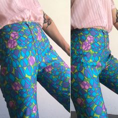 "Vintage high waist pants Made in France 1970s Abstract pattern pants in blue,green and pink colors. Trapered pants with crease . Front zipper and hook. Slightly shiny fabric. High waist. In good condition. To note: Retouch on bottom of the right leg present (photo). Price takes into account it flaws. Estimated size : FR38 US6 UK8 Our model wears usually a size S (UE36/38) and is 170cm/66,9\" tall. Measurements (flat): Waist: 33cm - 12,9\" Hips: 50cm - 19,6\" Front crotch: 27cm - 10,6\" Back cro Fitted Wide Leg Pants With Retro Print, Retro Full-length Pink Pants, Pink Retro Pants, Retro Wide Leg Pants For Spring, Fitted Retro Pants With Retro Print, Vintage Wide Leg Pants With Retro Print, Retro High Waist Pink Pants, Vintage Pink Wide Leg Bottoms, Vintage Pink Wide-leg Bottoms