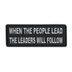 a black and white patch that says, when the people lead the leaders will follow