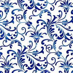 a blue and white wallpaper pattern with swirls on the side, as well as an ornate design