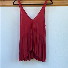 Never Worn. Very Soft Material With A Flowy Fit That’s Easy To Throw On! V-Neck And Lightweight. Feminine Flowy V-neck Top, Red V-neck Top From Urban Outfitters, Flowy V-neck Beach Top, Red Flowy V-neck Blouse, Yellow Halter Top, Vibrant Red V-neck Top, Fringe Tank Top, Urban Outfitters Top, Pink Corset