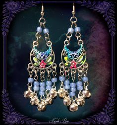 "These Small Floral belly dancer Chandelier Earrings are made with hand-painted plated floral pendants adorned with colorful glass beads and dangling jingle bell charms. Available with French Wires, Leverbacks, Posts or Clip-Ons. -2 1/2\" Long x 1\" Wide -0.1 oz. ea -Many Colors Available in the pull-down menu! (Periwinkle is seen in the video) Metal Finishes Available: -Gold -Silver Longer Version: https://www.etsy.com/listing/251271742/ready-to-ship-silver-gypsy-bellydancer?ref=shop_home_activ Bohemian Bell Earrings For Festivals, Bohemian Festival Earrings With Bells, Blue Festival Earrings With Latkans, Blue Latkans Jewelry For Festival, Blue Dangle Chandelier Earrings For Festival, Blue Bohemian Chandelier Earrings For Festival, Blue Traditional Chandelier Earrings For Festivals, Traditional Blue Chandelier Earrings For Festivals, Metal Dangle Chandelier Earrings For Festivals