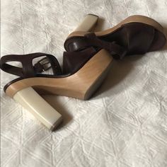 Very Comfortable Spring/Summer Platform Sandals. Sandals Can Be Matched With So Many Different Amazing Outfits. ***Size 38***Runs Small-Will Fit 7/7.5. ***This Item Is A Sample. There May Be A Slight Imperfections*** Heel 5.25 Platform 1.75 **New Without Tag** Brown Heels With Removable Insole For Summer, Brown Padded Heel Sandals For Beach, Brown Beach Sandals With Padded Heel, Summer Leather Block Heel Sandals, Brown Summer Sandals With Block Heel, Brown Block Heel Summer Sandals, Leather Block Heel Summer Sandals, Leather Block Heel Sandals For Summer, Summer Heels With Removable Insole And Open Heel