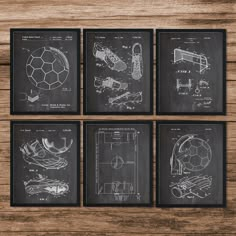 four framed drawings of soccer equipment on a wooden table with a blackboard in the background