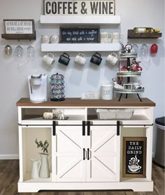 a coffee and wine shop with white cabinets