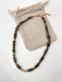 Bring a touch of nature to your jewelry collection with this short necklace made of Indian agate. The earthy and soothing tones of the semi-precious stones, embellished with delicate golden beads, create a perfect harmony for a boho-chic look. This necklace is both timeless and modern, ideal for completing a casual outfit or adding a touch of sophistication to a dressy outfit. Interview : To preserve the beauty of your necklace, avoid direct contact with water, perfumes and other chemicals. Stor Outfit Interview, Dressy Outfit, Golden Beads, Indian Agate, Agate Necklace, Dressy Outfits, Choker Necklaces, Short Necklace, Casual Outfit