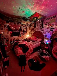 a bedroom with lots of lights on the ceiling