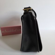 "Vtg Classic Coach NYC Stewardess Bag Navy leather (almost black) with brass hardware Roomy interior with inner zip pocket, outer full slip pocket and a small slip pocket Covered by a flap and secured with a turnlock Original hangtag and chain Adjustable 31\" strap at longest Measures: 11\"L, 11\"H, 3\"W Made in New York, USA #384-3612 Cleaned, conditioned and ready to wear! Questions? Just ask More vtg coach styles/colors also available G144" Office Shoulder Bag Satchel With Brass Hardware, Retro Shoulder Bag With Gold-tone Hardware For Travel, Formal Saddle Shoulder Bag With Brass Hardware, Black Business Saddle Bag With Gold-tone Hardware, Black Saddle Bag With Gold-tone Hardware For Business, Black Shoulder Bag With Coin Pocket For Travel, Classic Office Shoulder Bag With Brass Hardware, Black Satchel Saddle Bag For Formal Use, Black Satchel Saddle Bag For Formal Occasions