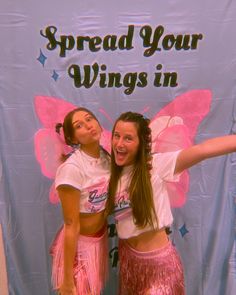 two girls in pink and white shirts posing for the camera