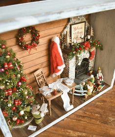 a miniature christmas scene in a doll house