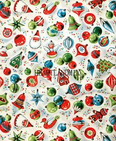 a close up of a white fabric with christmas decorations on it and polka dots in the background