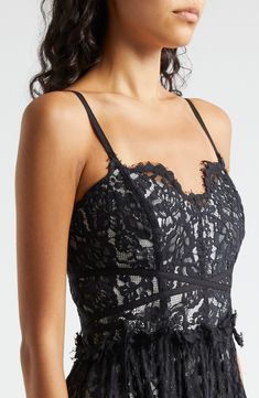 Be the bewitching one in a black lace dress designed with a fitted bodice, contrast lining and a gently tiered skirt. 39 1/2" center front length (size 8) Hidden back-zip closure Sweetheart neck Adjustable straps Lined 63% cotton, 37% polyester Machine wash, line dry Imported Black Dress With Boned Bodice And Spaghetti Straps, Scalloped Lace Dress With Sweetheart Neckline For Night Out, Fitted Lace Dress With Lined Bodice, Elegant Underbust Party Dress, Lace Dress With Fitted Bodice And Spaghetti Straps, Black Scalloped Lace Dress For Formal Occasions, Lace Dresses With Sweetheart Neckline, Black Lace Dress With Contrast Lace For Night Out, Black Dress With Lace Bodice