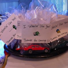 there is a car on the plate with thank you notes