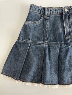 Get ready to turn heads with our Lace Trim Pleated Denim Mini Skort! This classic skort is the perfect addition to any girly wardrobe. With its flirty pleated denim skirt and delicate lace trim, it's sure to add a fun and playful touch to any outfit. Elevate your style game with this must-have piece. Size Chart: Size Waist (cm) Hips (cm) Length (cm) Waist (in) Hips (in) Length (in) S 64 92 37 25.20 36.22 14.57 M 68 96 38 26.77 37.80 14.96 L 72 100 39 28.35 39.37 15.35 XL 76 104 40 29.92 40.94 15 Casual Cotton Mini Skirt With Lace Trim, Corduroy Skirt Outfit, Retro Kawaii, Pleated Denim Skirt, Mini Skirt Fashion, Korean Skirt, Streetwear Spring, Skirt Streetwear, Jean Skirts