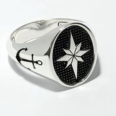 💍 Amazing North Star signet ring.       Unisex oval chevalier ring. 📜 A North Star sign engraving on top anchor engraving on bands, with hand polishing and black         oxidized or black/blue enamel work.        Available in gold K9, K14, or K18 with an amazing optical look.  ⚖ Ring weight 12gr approximately. 📐 Total dimensions 14x18 on top .  ✍ Designed and created by Babuco Jewellery Athens.  ♻   Recycled item! 💍 A special gift for your loving person or yourself! 🎁 Gift box included! 😊 Thank you for stopping by! 🛠   Free services to renew your beloved jewels purchased from my shop.          You will be charged only for the shipping costs. Symbolic Oval White Gold Signet Ring, John Hardy Rings, North Star Ring, Enamel Rings, Anchor Rings, Silver Jewelry Cleaner, Recycled Items, Local Jewelry, Enamel Ring