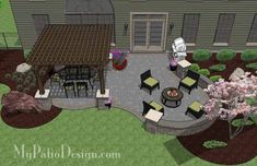 an outdoor patio is shown with furniture and landscaping