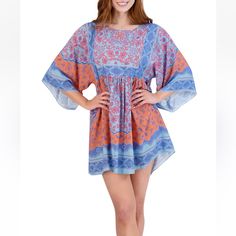 Billowy Kimono Sleeves And An All-Over Mix Of Prints Collide On This Babydoll Dress From Robbie Bee. *Size Medium *New With Tags *Pullover *Round Neck *3/4 Kimono Sleeves *Lined *Imported *Product Specifications *36" L *Material & Care *Rayon *Machine Washable Blue Flowy Boho Dress For Beachwear, Flowy Pink Beach Dress For Festival, Blue Floral Print Tunic For The Beach, Pink Printed Boho Dress For Beach, Flowy Light Blue Mini Dress For Vacation, Spring Blue Boho Dress For Beach, Blue Boho Print Mini Dress For Spring, Printed Blue Tunic For Spring, Blue Flowy Tunic Boho Dress