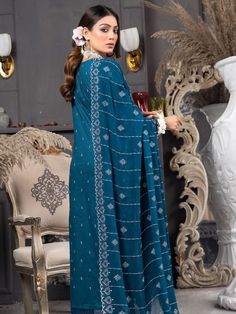 Brand: ManizayProduct Code: Talash D-04Collection: Manizay Talash Premium Embroidered Lawn CollectionFabric: Lawn DESIGN DETAILS: Embroidered Lawn Shirt Embroidered Chiffon Dupatta Dyed Trouser DISCLAIMER:* Lining, Laces, and Tassels are not included in unstitched variants.* Embellishment items in stitched outfits are subject to market availability.* Product color may vary due to photographic lighting or your device settings. CARE INSTRUCTIONS: Extra Fabric Has Been Used For Shoot Original Color Lawn Design, Alkaram Studio, Embroidered Chiffon, Lawn Shirts, Chiffon Dupatta, Extra Fabric, Fabric Stores Online, Shopping Websites, Designer Suits