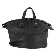 100% authentic Givenchy Nightingale bag in a black goatskin leather featuring dual top handles, detachable shoulder strap with zipper accent detail. Metal logo at bottom of top handles. Opens with a zip closure on top. Lined in black canvas with two inner slip pockets and one one zip pocket against the back. Has been carried and is in excellent condition. Measurements Height 30cm (11.7in) Width 36cm (14in) Depth 16cm (6.2in) Drop of the Handle 11cm (4.3in) Shoulder Strap Length 58cm (22.6in) Hardware Silver-Tone Blindstamp MA110 All our listings include only the listed item unless otherwise specified in the description above. Givenchy Nightingale, Structured Shoulder, Medium Tote Bag, Julien Macdonald, Nightingale, Cate Blanchett, Medium Tote, Tote Bag Leather, Metal Logo