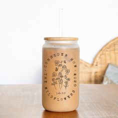 a mason jar sitting on top of a wooden table