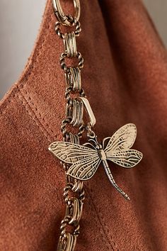 Add the perfect timeless touch to every bag in your collection with this super sweet bag charm featured in a staple metal fabrication and dragonfly-inspired design. | Dragonfly Bag Charm by Free People in Gold Bag Charm Ideas, Free People Bags, Dragonfly Jewelry, Sweet Bags, Bag Charms, Handbag Charms, Metal Fabrication, Brown Bags, Super Sweet