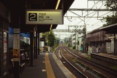 the train station is empty and ready for passengers to board