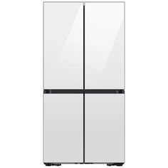 a white refrigerator freezer sitting next to each other